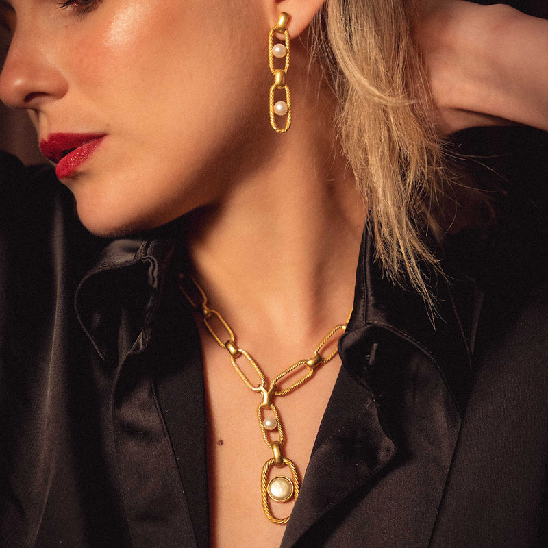 ARETES NEXO PERLA DOBLES